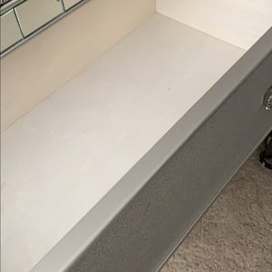 Twin size bed and matching chest drawer .